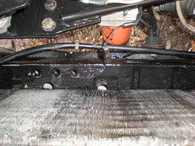 Rust under radiator after 2-2012.JPG