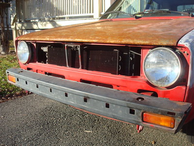 the front of the car w/o a grille-i need a single headlight w/ emblem and silver lining